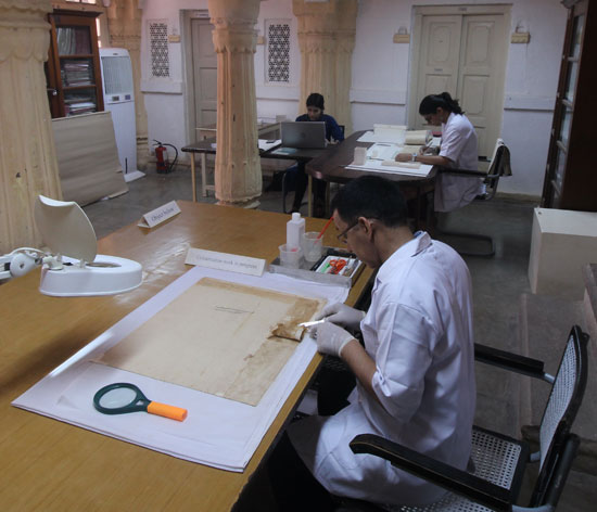 Conservators at work in the Mehrangarh Museum conservation centre, Jodhpur