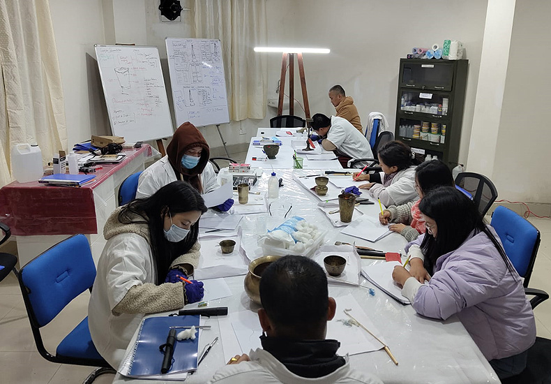 Participants at work in the conservation lab.